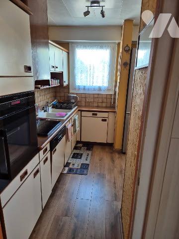 Appartement T4 au demi RDC avec grand balcon exposé Sud/Est