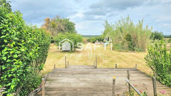charmante maison des années 1950 dans son cadre verdoyant