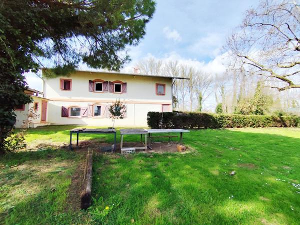 Immeuble de rapport 4 appartements et une maison