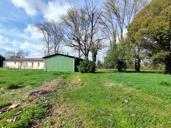 Immeuble de rapport 4 appartements et une maison