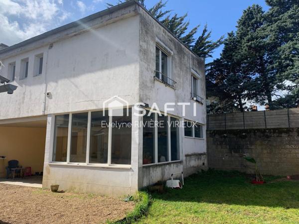Maison 4 chambres de 122 m², dépendances et jardin