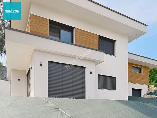 A vendre sur EPAGNY METZ-TESSY une maison contemporaine de 5 pièces de 141 m², avec terrasse, jardin et garage