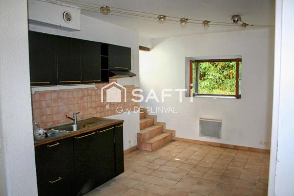 T3 en rez-de-chaussée avec terrasse – Centre village, proche frontière