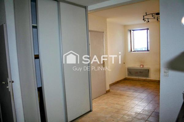 T3 en rez-de-chaussée avec terrasse – Centre village, proche frontière