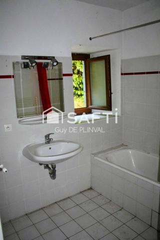 T3 en rez-de-chaussée avec terrasse – Centre village, proche frontière