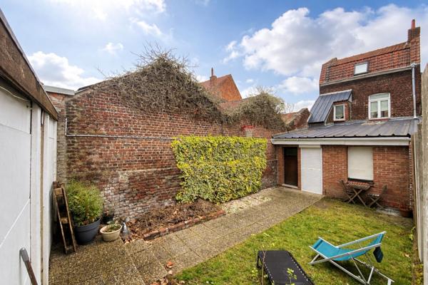 Immeuble Lomme 103 m² - deux appartements - garage - jardin partagé - proche métro