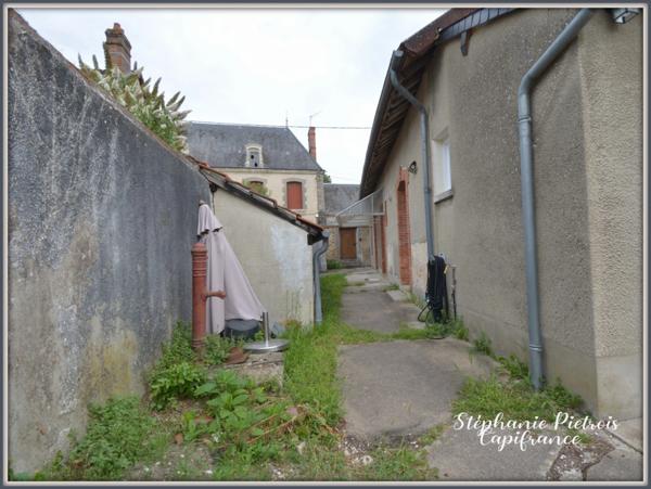 Maison de ville à fort potentiel + studio de 50m2