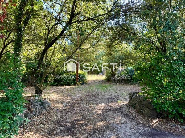 MAISON ENTIEREMENT RENOVEE SUR TERRAIN BOISE DE 1935M²