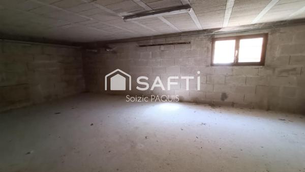 Maison de plain-pied avec sous-sol total proche d'une gare