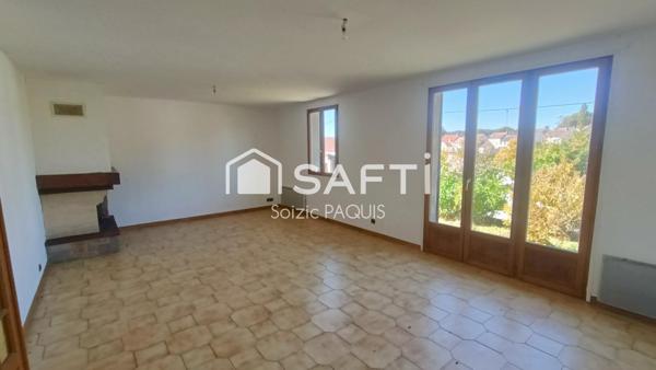 Maison de plain-pied avec sous-sol total proche d'une gare