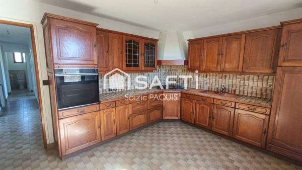 Maison de plain-pied avec sous-sol total proche d'une gare