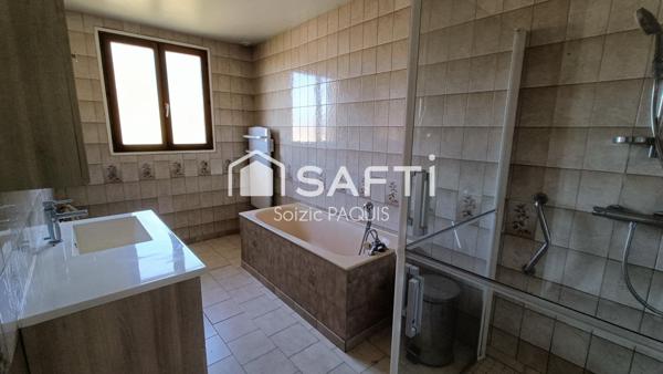 Maison de plain-pied avec sous-sol total proche d'une gare