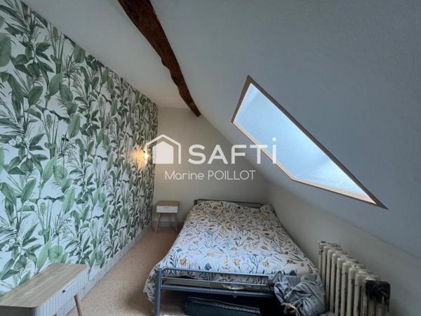 Maison d’habitation avec jardin et cave