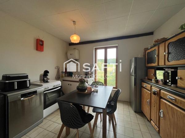 Maison d’habitation avec jardin et cave