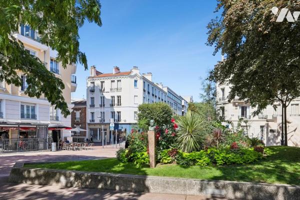 Appartement ensoleillé sur la place de la mairie