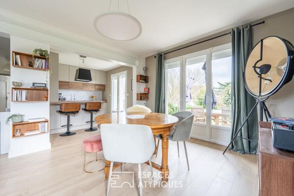 Lumineuse maison avec jardin arboré