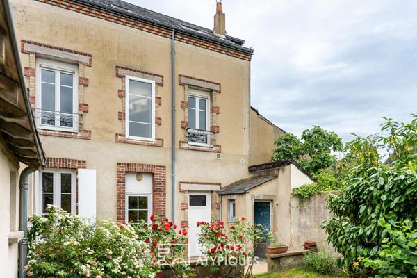 Double mancelle de charme avec garage à réinventer