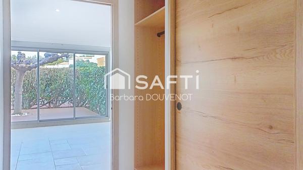 Appartement rénové - Rez-de-chaussée proche plage - 79 m², 2 suites, jardin et terrasse, 2 places de parking.