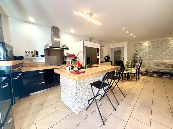 Maison de village de 90m² avec ascenseur, garage et terrasse