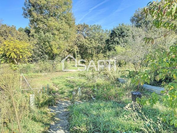 FONTENILLES - T4 de 91 m2 avec s-sol et jardin