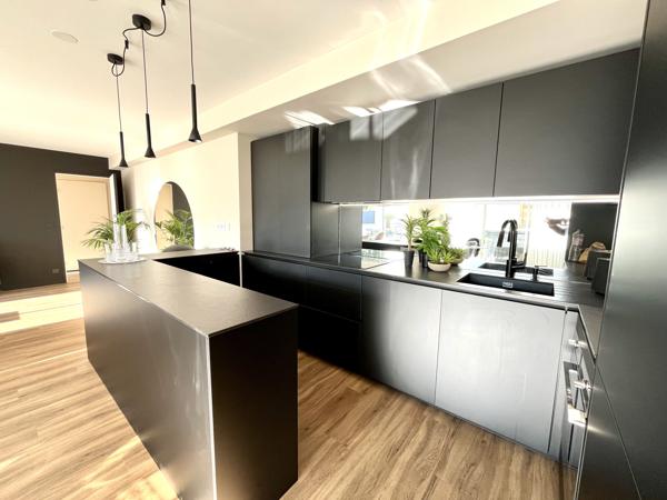 Appartement 102 m² rez de chaussée double garage terrasse
