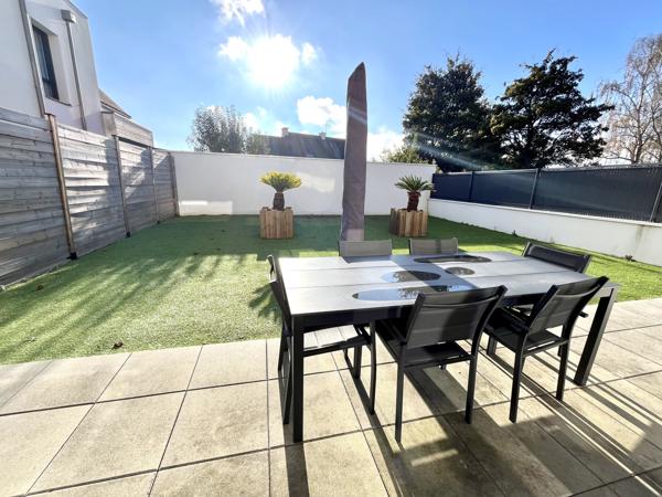 Appartement 102 m² rez de chaussée double garage terrasse