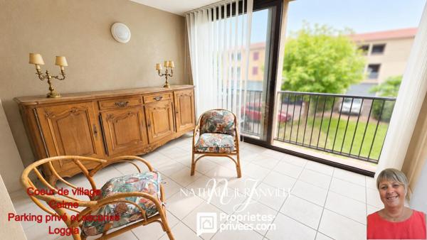 T2 de plus de 60 m² utiles avec grande loggia fermée et parking privé