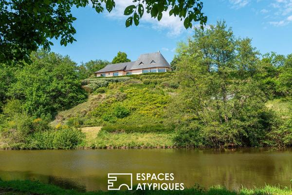 Maison de charme avec étang dans un cadre verdoyant