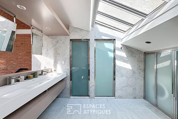 Duplex dernier étage esprit loft rénové par architecte proche Place des Victoires