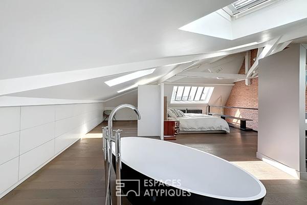 Duplex dernier étage esprit loft rénové par architecte proche Place des Victoires