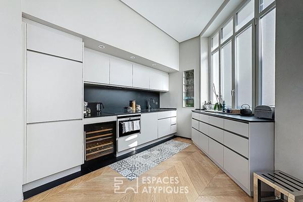 Duplex dernier étage esprit loft rénové par architecte proche Place des Victoires