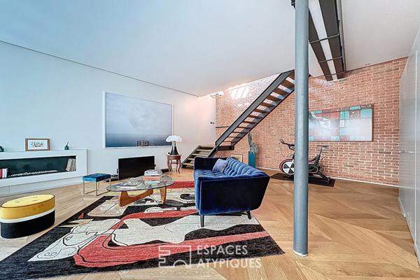 Duplex dernier étage esprit loft rénové par architecte proche Place des Victoires