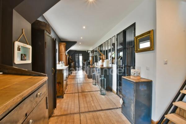 Maison individuelle de type loft dans un secteur prisé