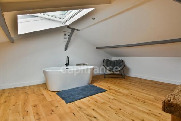 Maison individuelle de type loft dans un secteur prisé