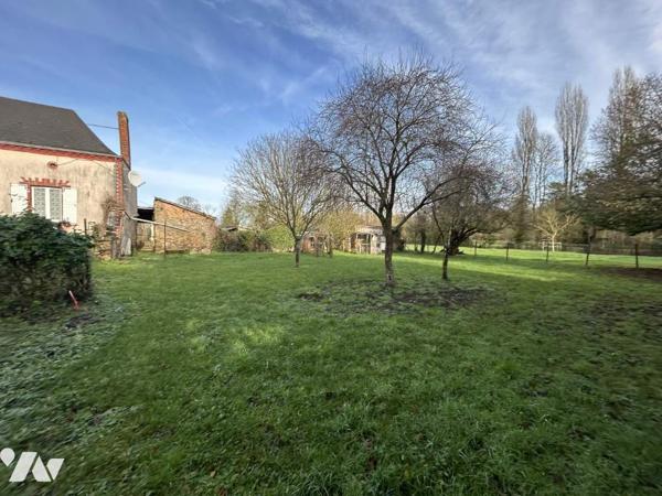 Maison à rénover avec potentiel et terrain
