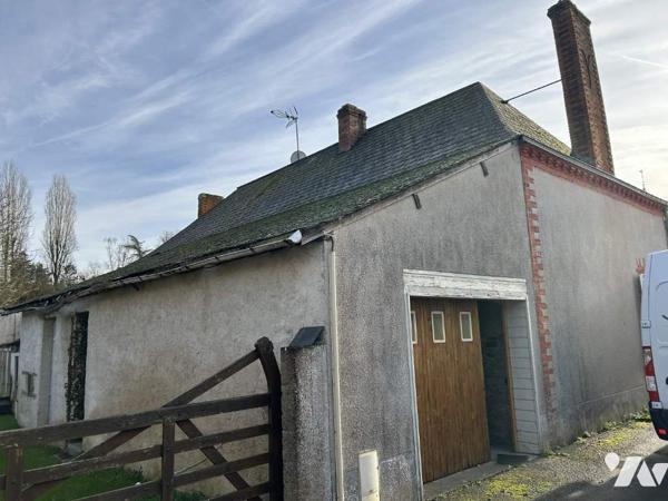 Maison à rénover avec potentiel et terrain