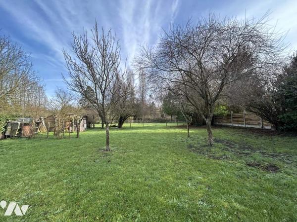 Maison à rénover avec potentiel et terrain