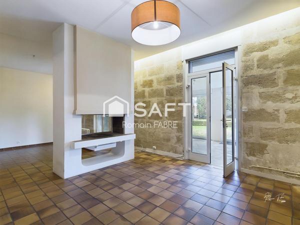 Maison de Maitre en pierre  « cœur de ville » avec cinq chambres, terrain intimiste et grand garage