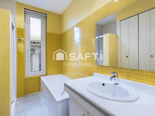 Maison de Maitre en pierre  « cœur de ville » avec cinq chambres, terrain intimiste et grand garage