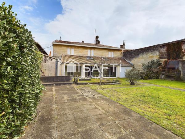 Maison de Maitre en pierre  « cœur de ville » avec cinq chambres, terrain intimiste et grand garage