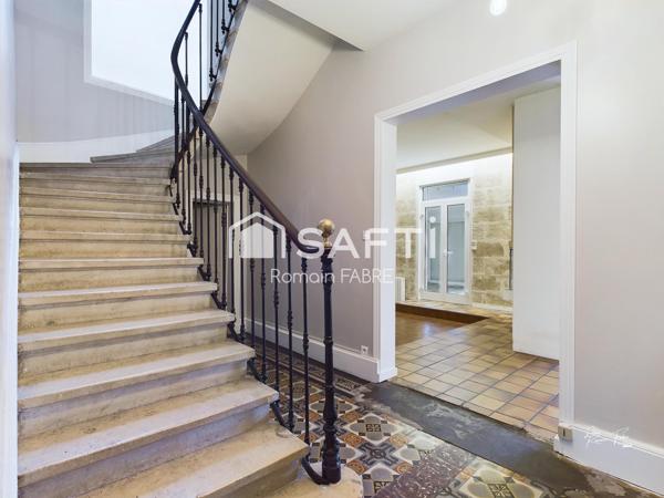 Maison de Maitre en pierre  « cœur de ville » avec cinq chambres, terrain intimiste et grand garage