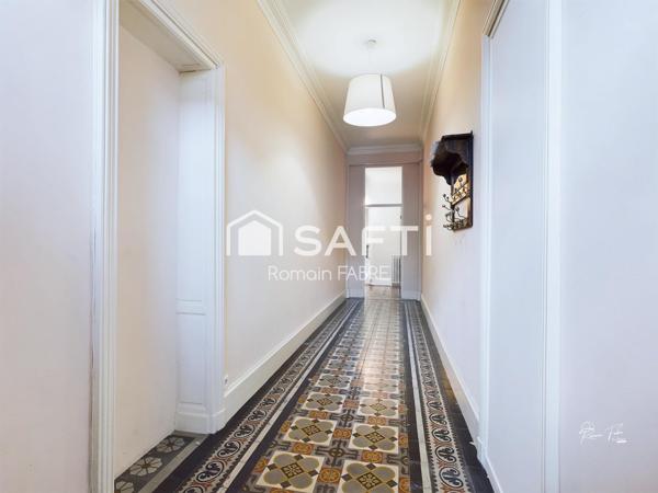 Maison de Maitre en pierre  « cœur de ville » avec cinq chambres, terrain intimiste et grand garage