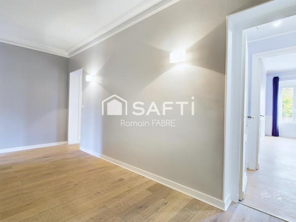 Maison de Maitre en pierre  « cœur de ville » avec cinq chambres, terrain intimiste et grand garage