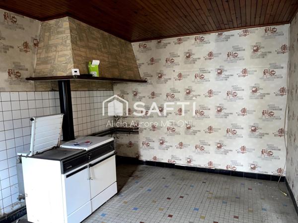 Maison de village à fort potentiel au cœur de DOMGERMAIN