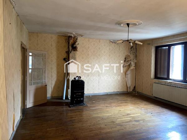 Maison de village à fort potentiel au cœur de DOMGERMAIN