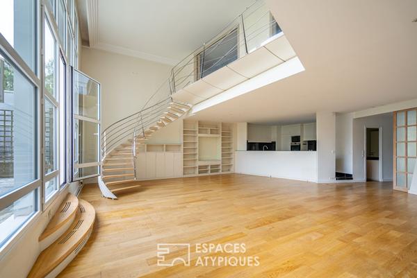 Duplex aux volumes exceptionnels près du parc des Buttes-Chaumont