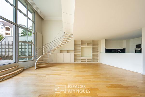 Duplex aux volumes exceptionnels près du parc des Buttes-Chaumont