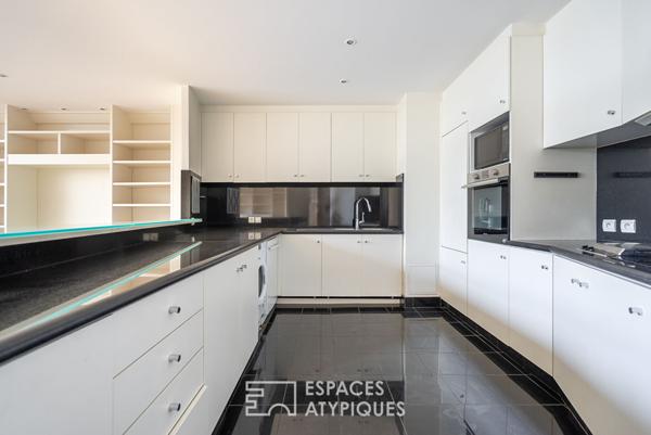 Duplex aux volumes exceptionnels près du parc des Buttes-Chaumont