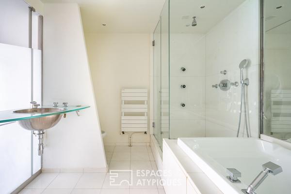 Duplex aux volumes exceptionnels près du parc des Buttes-Chaumont