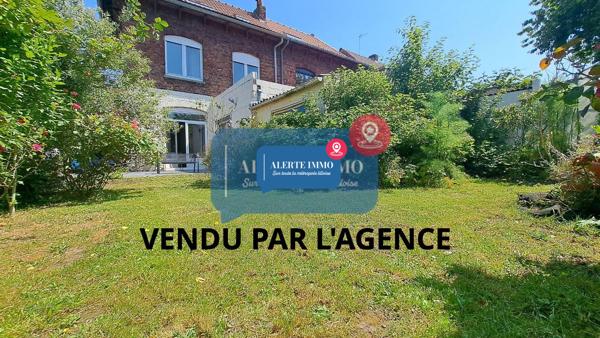Maison semi-individuelle de 103 m2 comprenant 2 ch + 2 possibles, 1 jardin, 1 terasse, 1 dépendance + 1 cave